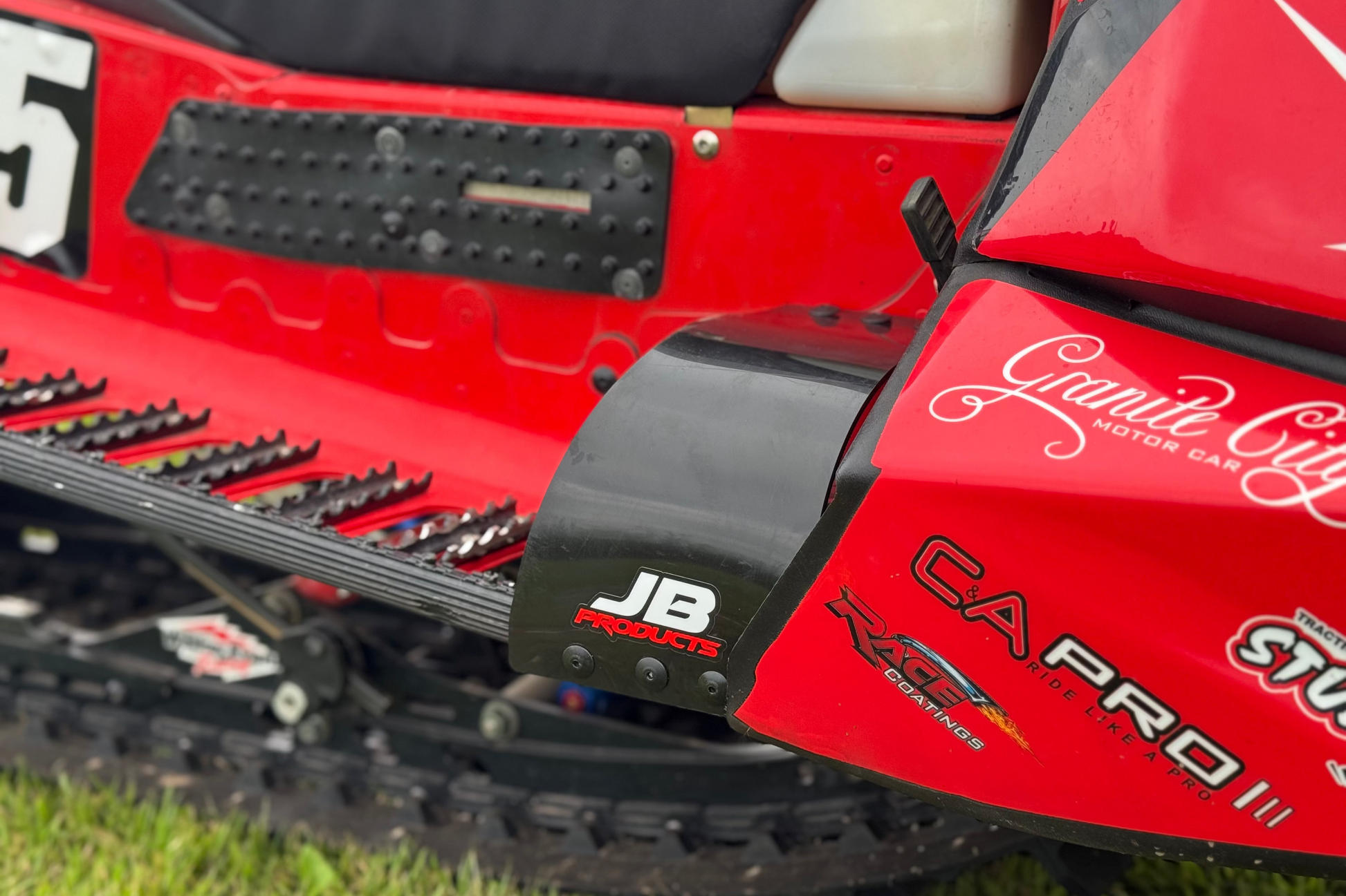 close up picture of jb products polaris snowmobile stirrup